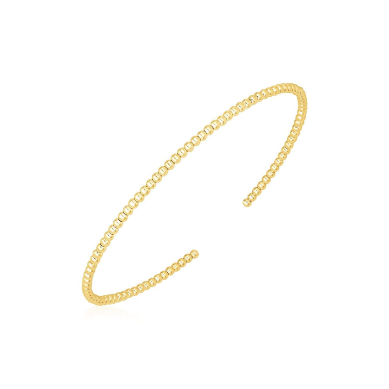 14k Yellow Gold High Polish Bead Cuff Bangle (2.00 mm) 14K yellow gold high polish bead cuff bangle in a slim 2.00 mm profile
