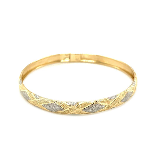 10K two-tone gold geometric bangle with round diamond accent stones