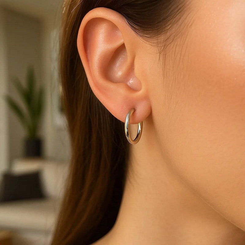 Polished Sterling Silver and Rhodium Plated Hoop Earrings (2x15mm) Polished rhodium plated sterling silver 2x15mm hoop earrings, no stones