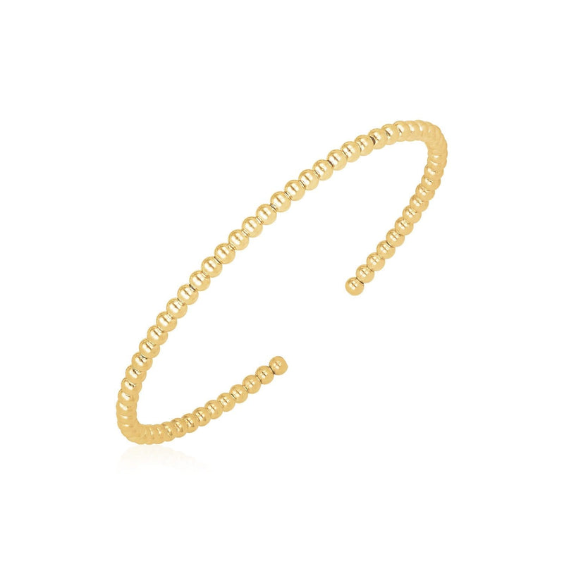 14k Yellow Gold High Polish Bead Cuff Bangle (3.00 mm) 14K yellow gold beaded cuff bangle with 3.00 mm high polish rail