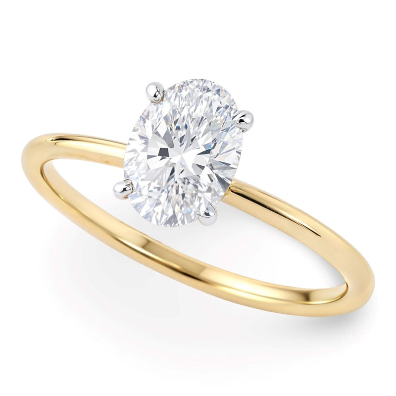 1 Carat Oval Lab Grown IGI G/VS1 Diamond Solitaire Ring in 14K Yellow Gold 14K yellow gold ring with 1 oval diamond solitaire stone