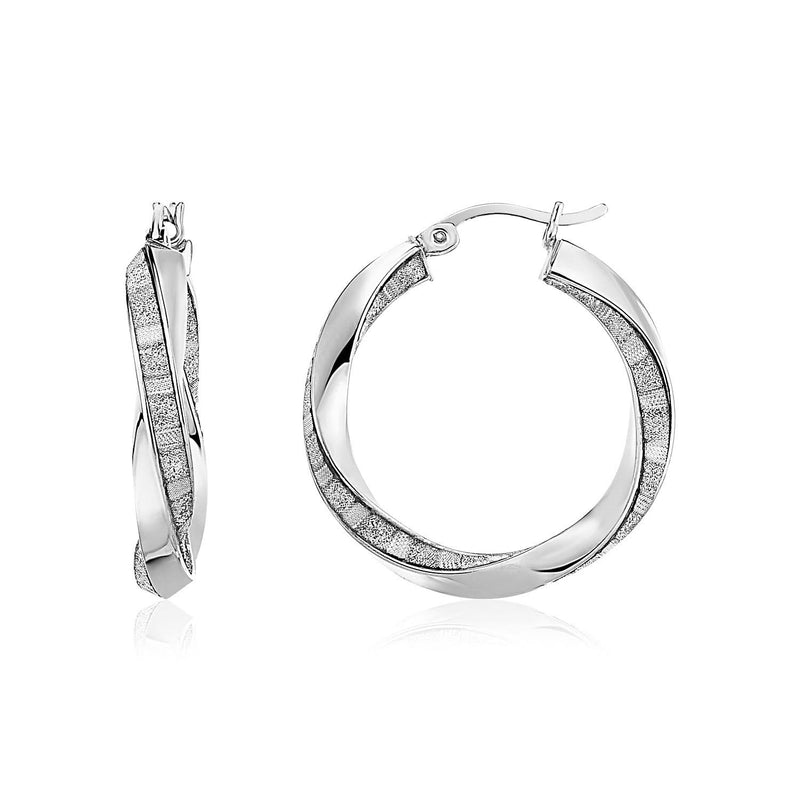 Sterling Silver Polished and Glitter Textured Twisted Hoop Earrings Sterling silver twisted hoop earrings with polished and glitter textured strands