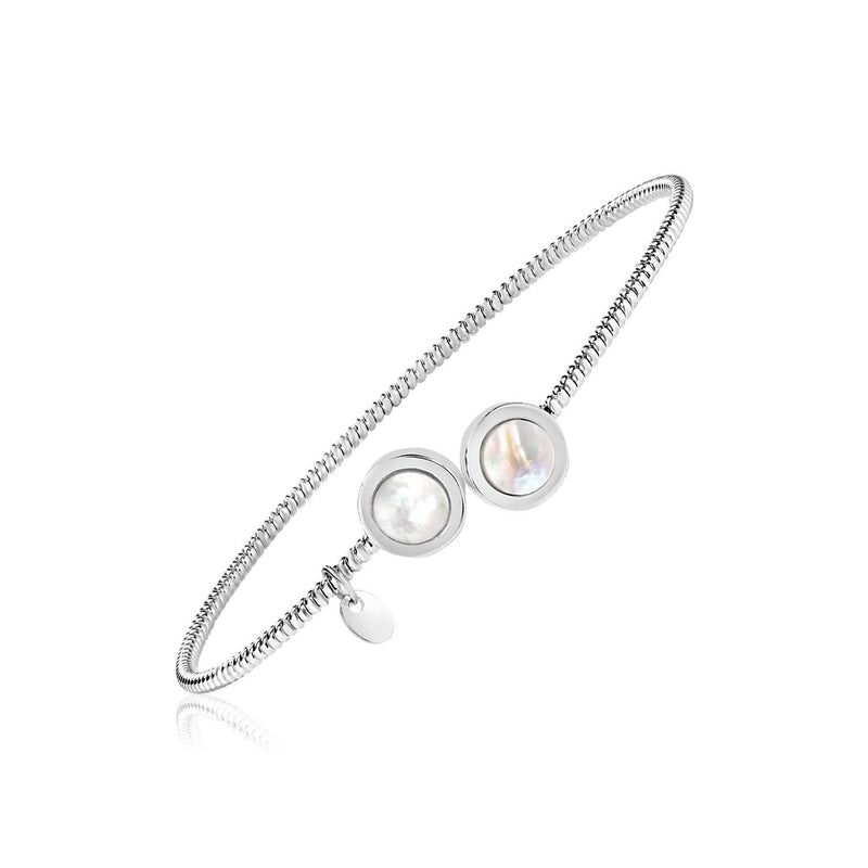 Sterling Silver Bangle with Mother of Pearl Circles Sterling silver bangle with pear mother of pearl stones