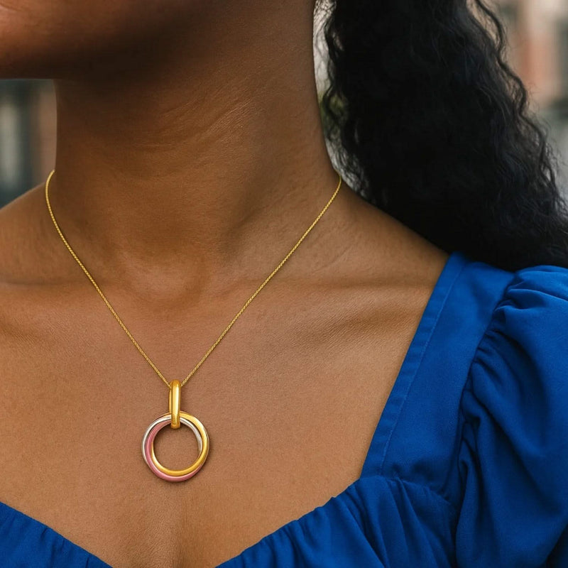 14k Tri-Color Gold Open Interlaced Ring Pendant 14K tri-color gold open interlaced loop pendant with fixed top bail
