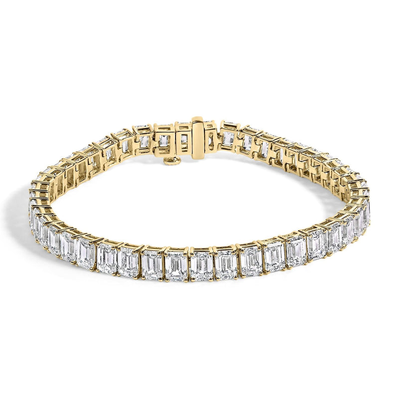 IGI Certified 14K Yellow Gold 18 1/2 Cttw Emerald Cut Lab Grown Diamond Tennis Bracelet 14K yellow gold tennis bracelet with emerald cut lab grown diamond stones