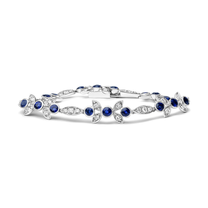 18K White Gold 1 3/4 Cttw Diamond and 3x3mm Round Blue Sapphire Gemstone Floral Link Bracelet (G-H Color, SI1-SI2 Clarity) - Size 7 18K white gold bracelet with round diamond and blue sapphire stones
