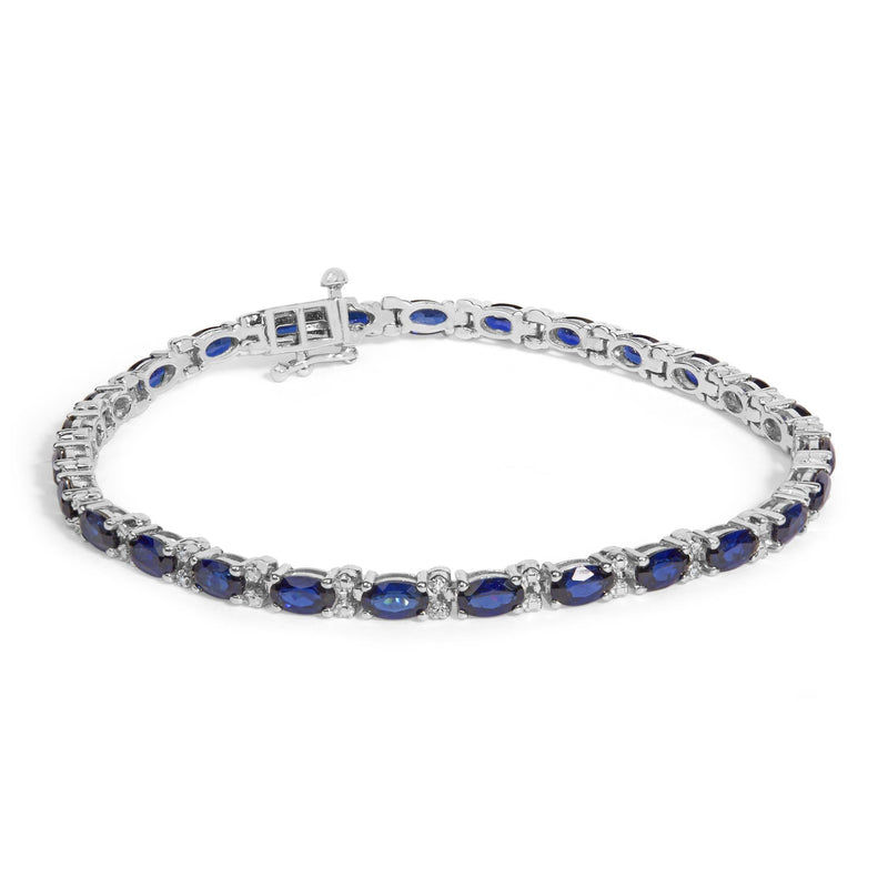 Sterling Silver Alternating Diamond Accent and Oval Blue Sapphire Tennis Bracelet