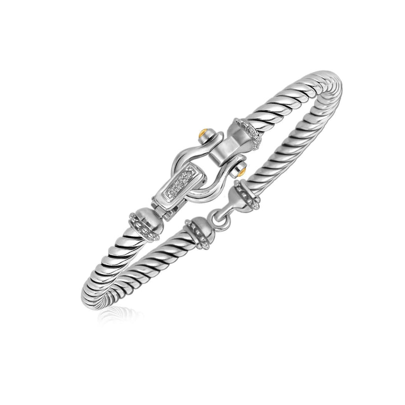 Italian Cable Bracelet with Diamond Accents in 18k Yellow Gold and Sterling Silver (.02 cttw) 18K yellow gold and silver cable bangle with round diamond accent stones