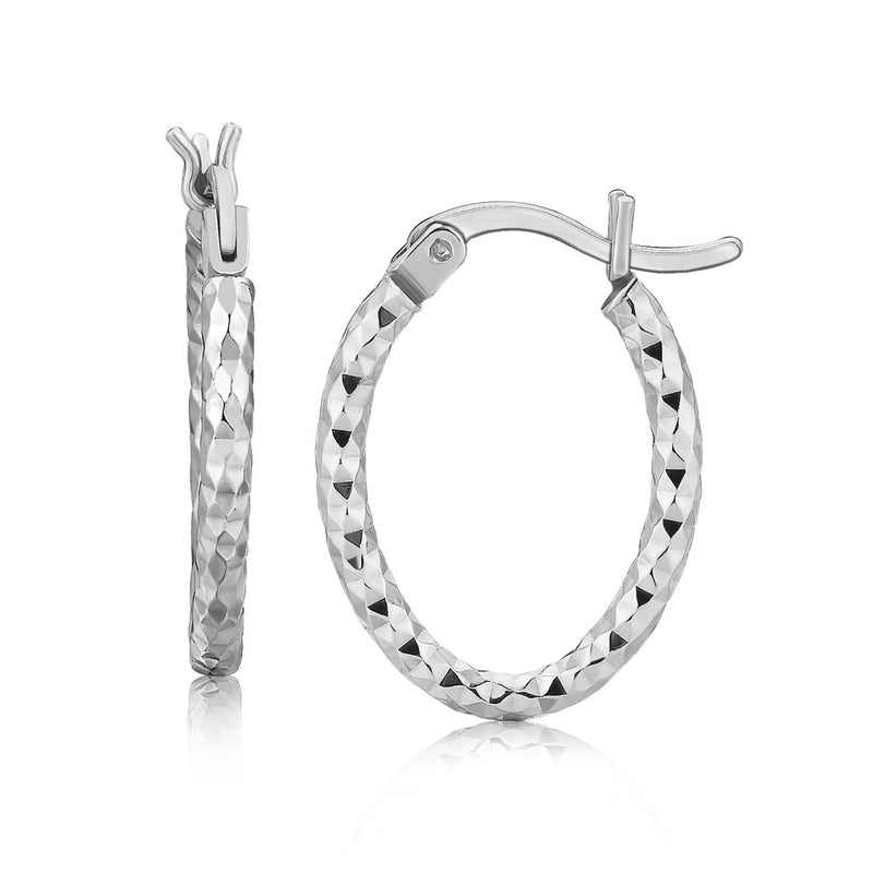 Sterling Silver Rhodium Plated Small Oval Hoop Diamond Cut Textured Earrings Rhodium plated sterling silver hoop earrings with oval diamond cut texture