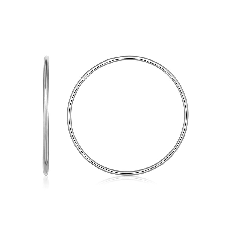 Endless Hoop Style Earrings in 14k White Gold 14K white gold endless hoop style earrings with polished closed loops