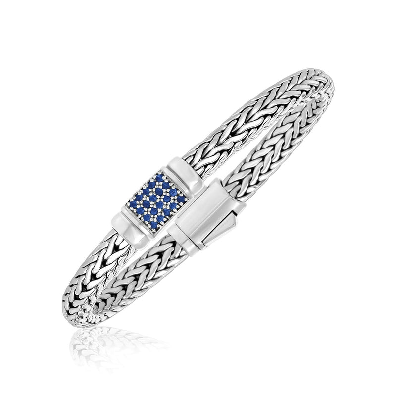 Sterling Silver Weave Motif Bracelet with Blue Sapphire Embellishments 925 sterling silver woven bracelet with blue sapphire accent stones