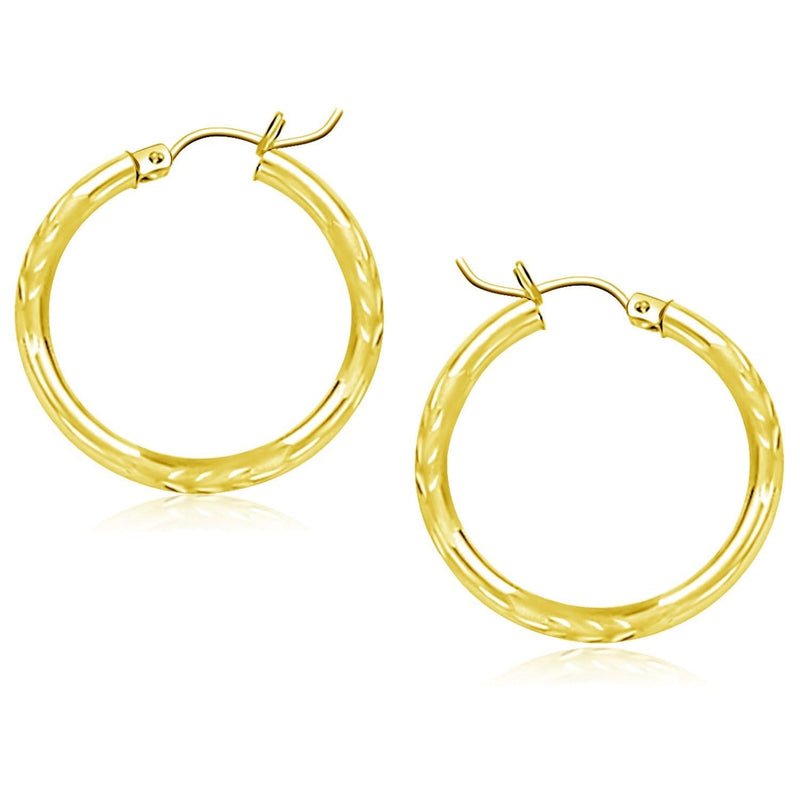 10k Yellow Gold Diamond Cut Hoop Earrings (25mm) 10K yellow gold diamond-cut 25mm hoop earrings with faceted surface