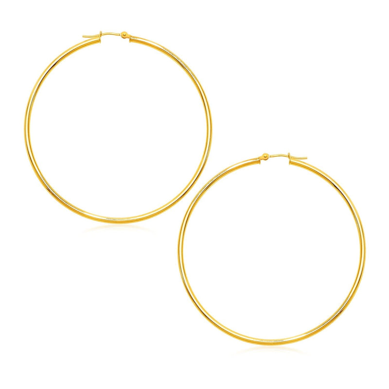 14K yellow gold large round hoop earrings with polished finish