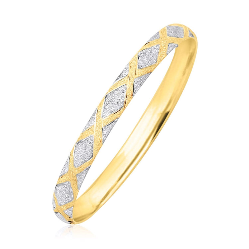 10k Two-Tone Gold Geometric Diamond Motif Bangle 10K two-tone gold bangle with geometric diamond motif set in yellow and white gold