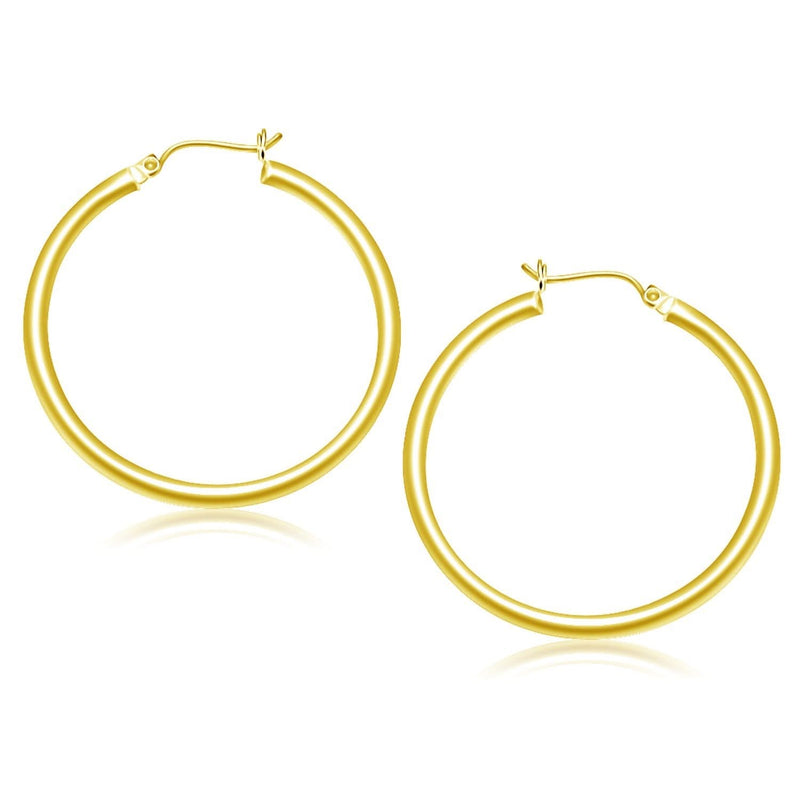 10k Yellow Gold Polished Hoop Earrings (40 mm) 10K yellow gold polished hoop earrings in a 40 mm rounded tube profile