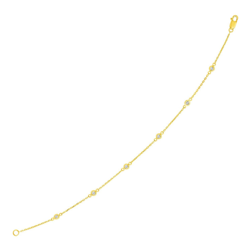 14k Yellow Gold 7 inch Bracelet with Diamond Stations 14K yellow gold bracelet with diamond stations along a fine chain