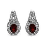 925 sterling silver stud earrings with oval red garnet and diamond accent stones thumbnail 1
