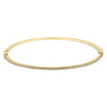 14K yellow gold half eternity bangle bracelet with round diamond stones