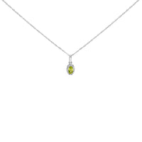 10K White Gold 5x3mm Gemstone and Diamond Accent Halo Oval Shape 18