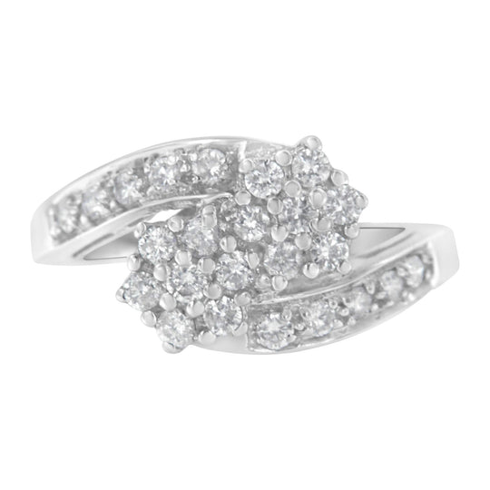 14K white gold ring with cluster-set round diamonds across the band