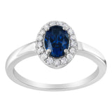 10K white gold ring with round diamond halo around a center gemstone thumbnail 1