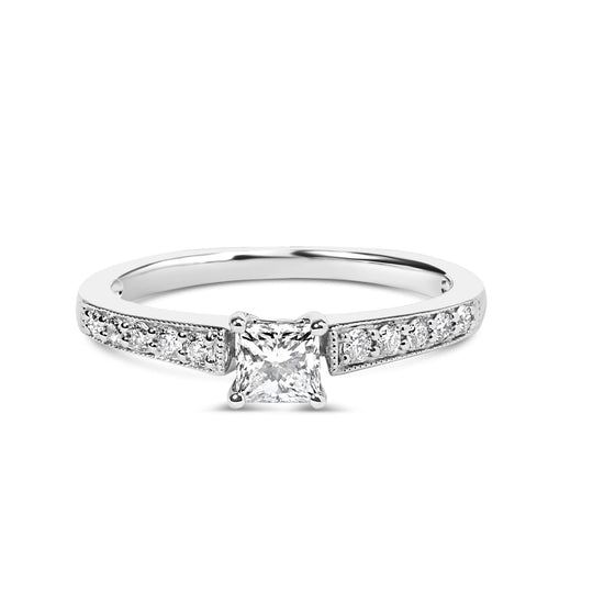 14K white gold ring with princess cut diamond center stone