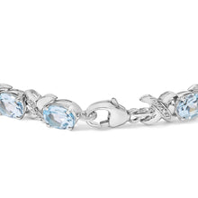 .925 Sterling Silver 16.0 Cttw Oval Blue Topaz and Diamond Accent Tennis X Link Bracelet (I-J Color, I1-I2 Clarity) - Size 7" Inch-1