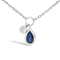 10K White Gold 6x4 mm Pear Blue Sapphire and Diamond  Accent Charm Pendant Necklace - 18