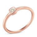 14K rose gold ring with cushion-shaped diamond in miracle setting