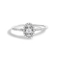 14K white gold ring with oval diamond and halo of accent stones