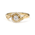 14K yellow gold ring with round diamond solitaire and halo swirl stones