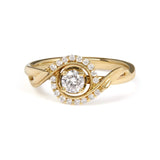 14K yellow gold ring with round diamond solitaire and halo swirl stones thumbnail 1