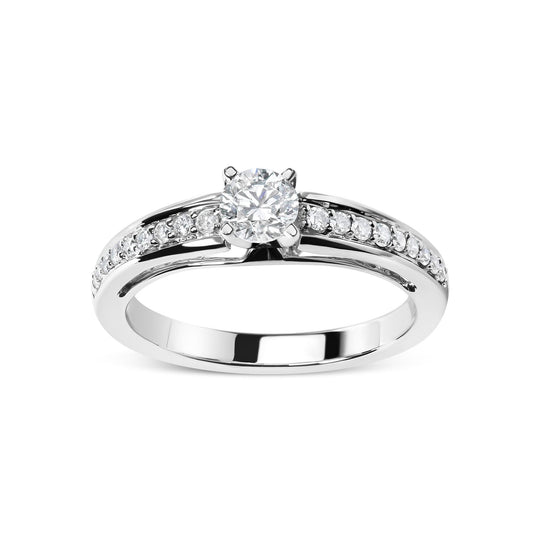 14K white gold solitaire ring with pavé diamond band and central round diamond