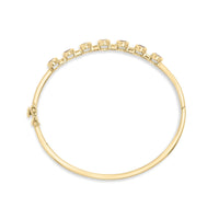 14K Yellow Gold Alternating Bezel Set 5MM Oval Shaped Tanzanite and 1/5 Cttw Diamond Bangle Bracelet (H-I Color, VS2-SI1 Clarity) - Fit's wrists up to 7.25