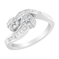 14K white gold ring with round and baguette diamond stones in bypass design