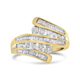 10K yellow gold ring with round and baguette diamond stones in bypass rows thumbnail 1
