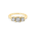 10K yellow gold ring with 3 round diamond stones in miracle illusion setting