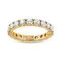 14K yellow gold ring with round diamond stones in shared prong eternity setting