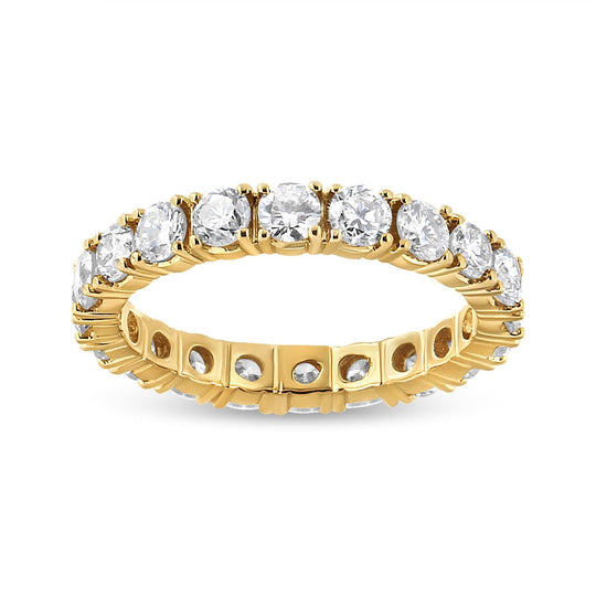 14K yellow gold ring with round diamond stones in shared prong eternity setting