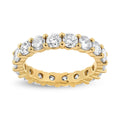 14K yellow gold ring with round diamond stones in shared prong eternity band