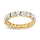 14K yellow gold ring with round diamond stones in shared prong eternity band thumbnail 1