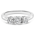 14K white gold ring with 3 round diamond stones in a level row