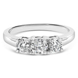 14K white gold ring with 3 round diamond stones in a level row thumbnail 1