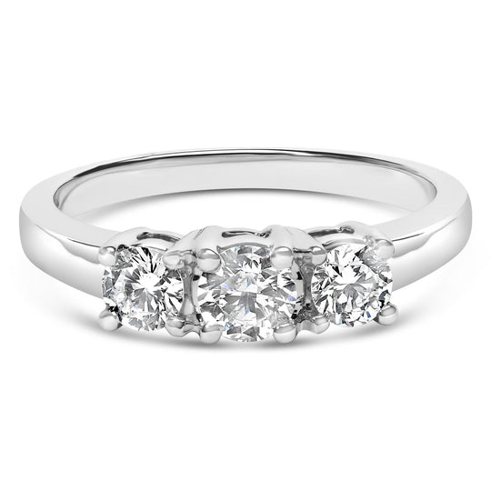 14K white gold ring with 3 round diamond stones in a level row