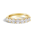 14K gold ring with 7 round diamond stones set in a row