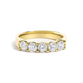 14K gold ring with 5 round diamond stones set in a row