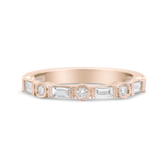 14K rose gold ring with baguette and round diamond stones