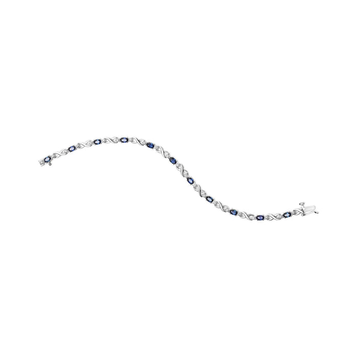 10K White Gold 5x4mm Oval Sapphire Gemstone and 1/10 Cttw Diamond Prong Set 