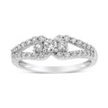 10K white gold ring with 3 round diamond stones in split shank setting