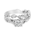 14K white gold ring set with multiple round diamond stones in vintage style